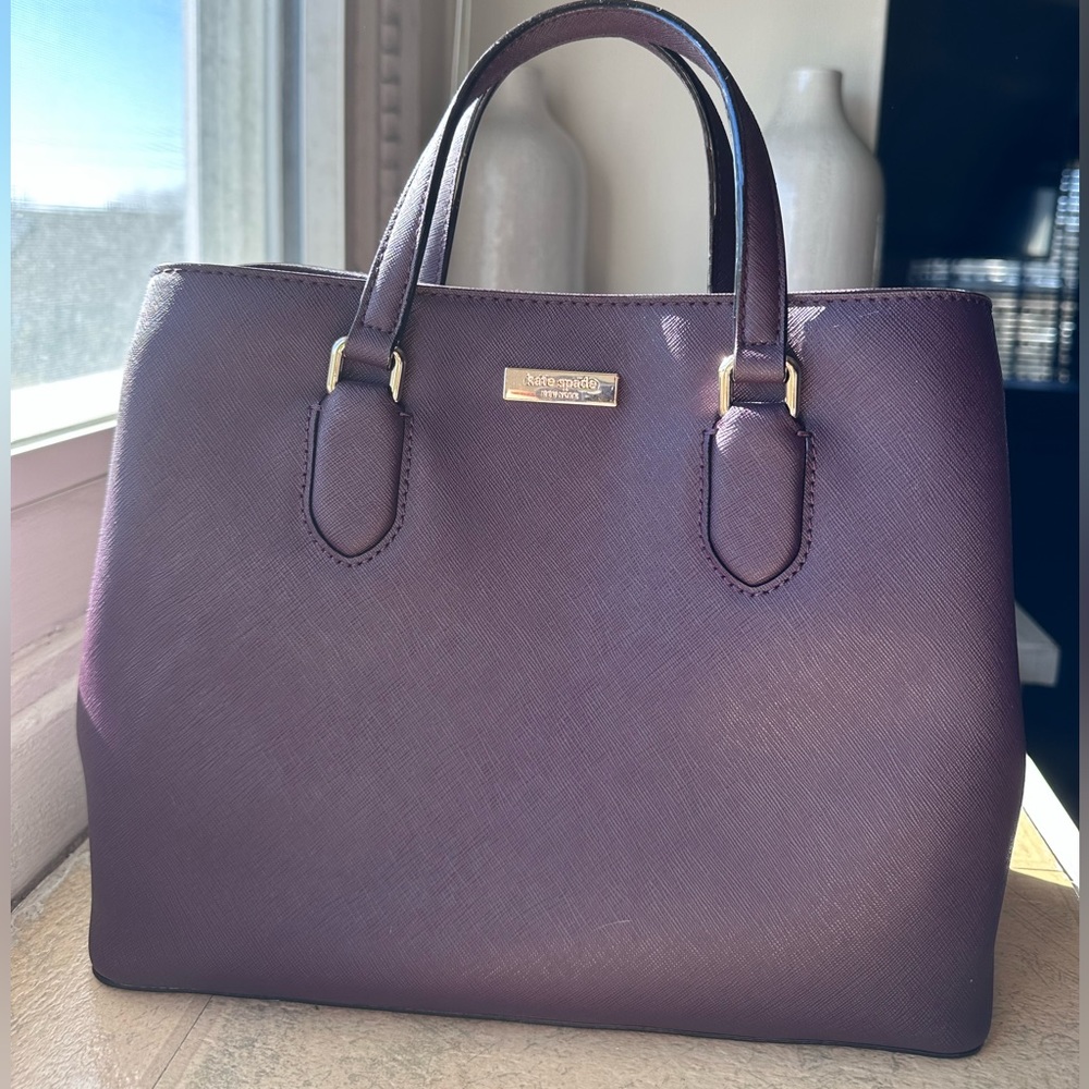 New condition KATE SPADE bag with shoulder strap.  Beautiful bright color